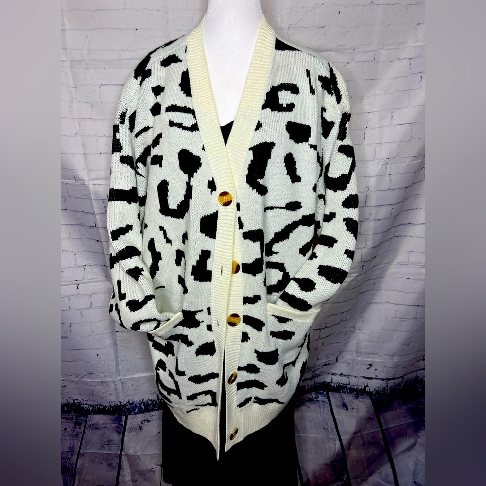 Animal, print, black and white cardigan button up sweater.